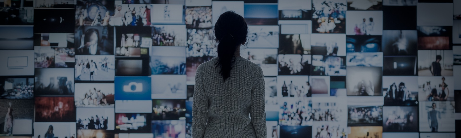 Person facing a wall of content representing the challenge of being selected and cited in AI-generated search answers